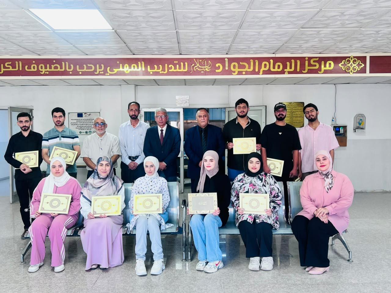 Cashier course — graduates with their certificates